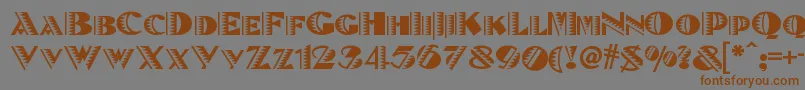 フォントBetenoirnf – 茶色の文字が灰色の背景にあります。