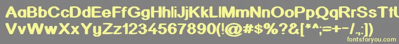 Kickass Font – Yellow Fonts on Gray Background