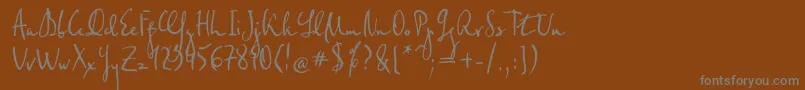 フォントFederico – 茶色の背景に灰色の文字