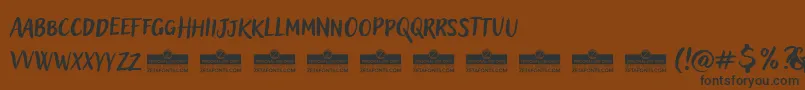 AdleryProBlockletterTrial Font – Black Fonts on Brown Background