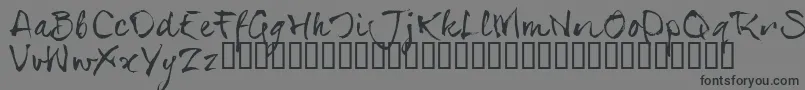 フォントSerialsT – 黒い文字の灰色の背景