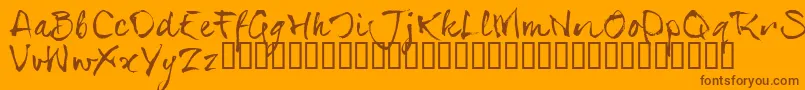 SerialsT-fontti – ruskeat fontit oranssilla taustalla