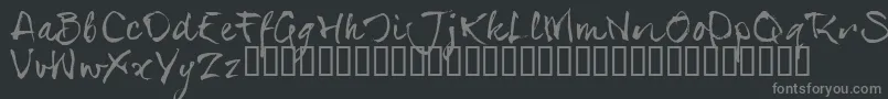 SerialsT-fontti – harmaat kirjasimet mustalla taustalla
