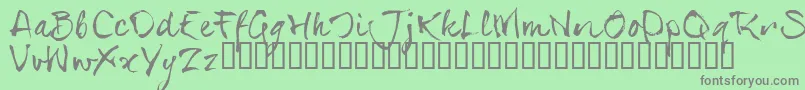 SerialsT-fontti – harmaat kirjasimet vihreällä taustalla