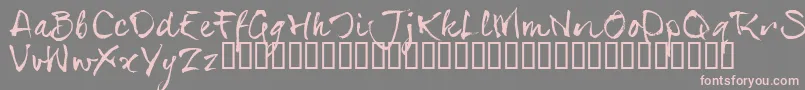 フォントSerialsT – 灰色の背景にピンクのフォント