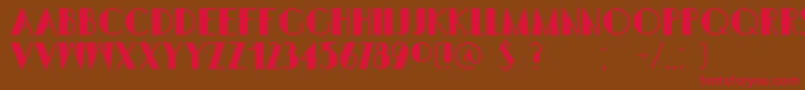 フォントDkSemarangKolonial – 赤い文字が茶色の背景にあります。