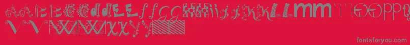 Bitsnbobs-Schriftart – Graue Schriften auf rotem Hintergrund