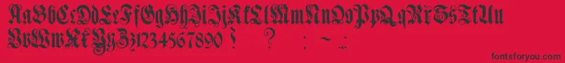GenzschEtHeyseAlternate-Schriftart – Schwarze Schriften auf rotem Hintergrund