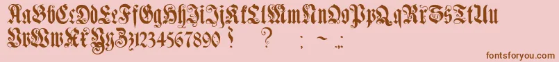 Fonte GenzschEtHeyseAlternate – fontes marrons em um fundo rosa