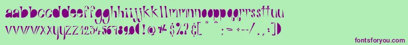 AlphabitsFat Font – Purple Fonts on Green Background