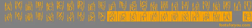 Шрифт Typoasisinitials – оранжевые шрифты на сером фоне