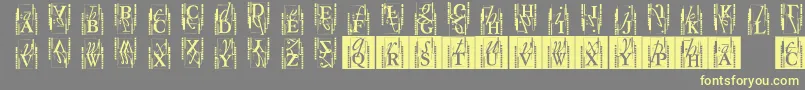Fonte Typoasisinitials – fontes amarelas em um fundo cinza