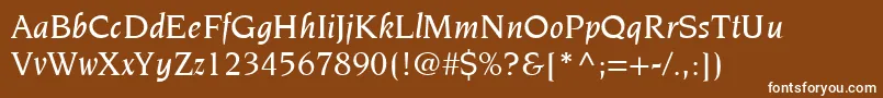ItcNovareseLtMediumItalic-fontti – valkoiset fontit ruskealla taustalla