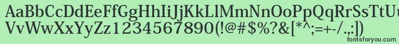 KozminproBold Font – Black Fonts on Green Background