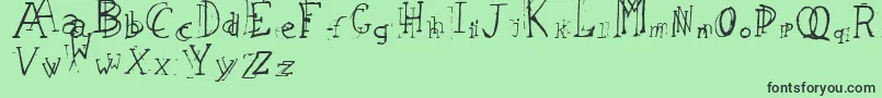 Fonte LeapingTypewriter – fontes pretas em um fundo verde