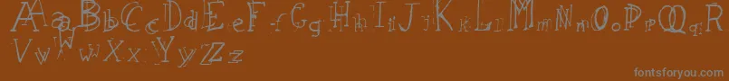LeapingTypewriter Font – Gray Fonts on Brown Background