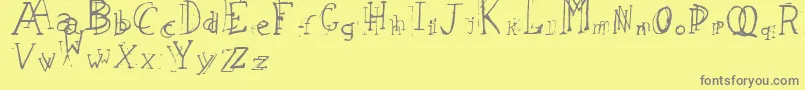 LeapingTypewriter Font – Gray Fonts on Yellow Background