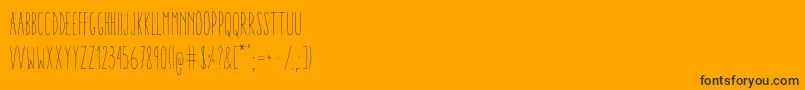 Czcionka AracneUltraCondensedLight – czarne czcionki na pomarańczowym tle