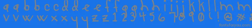 LucyLuToo-Schriftart – Graue Schriften auf blauem Hintergrund