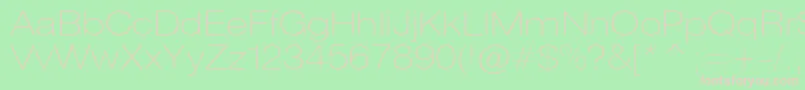Heliosextthinc-fontti – vaaleanpunaiset fontit vihreällä taustalla