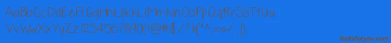 Kellilynn Font – Brown Fonts on Blue Background