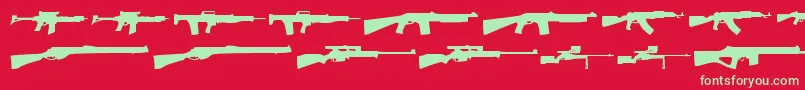 Guns1-Schriftart – Grüne Schriften auf rotem Hintergrund