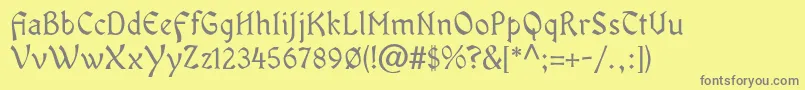 OldaniaadfstdRegular-Schriftart – Graue Schriften auf gelbem Hintergrund
