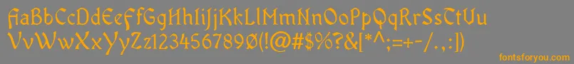OldaniaadfstdRegular-Schriftart – Orangefarbene Schriften auf grauem Hintergrund