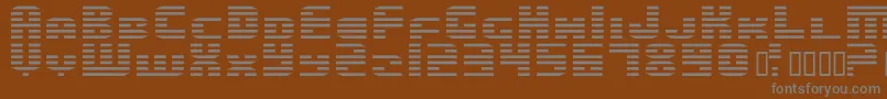 EnduroDos Font – Gray Fonts on Brown Background