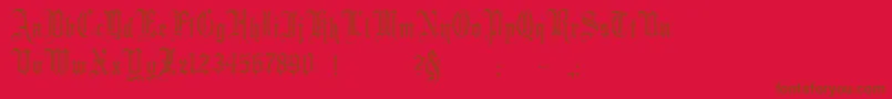 Minster2-Schriftart – Braune Schriften auf rotem Hintergrund