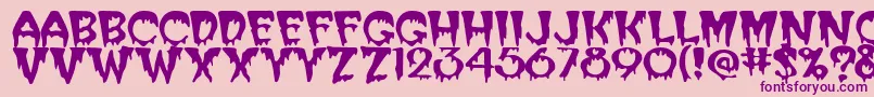 SanasoftCreeper.Kz-fontti – violetit fontit vaaleanpunaisella taustalla