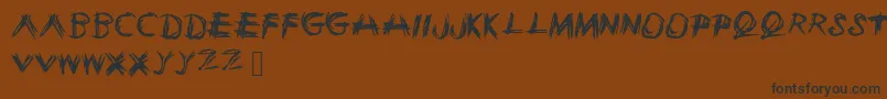 Sketchie Font – Black Fonts on Brown Background