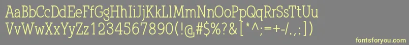 フォントQlarendonCondensed – 黄色のフォント、灰色の背景