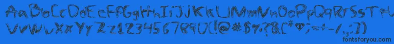 TheSpaz Font – Black Fonts on Blue Background