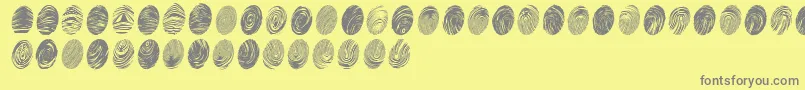 Czcionka Powdrfp – szare czcionki na żółtym tle