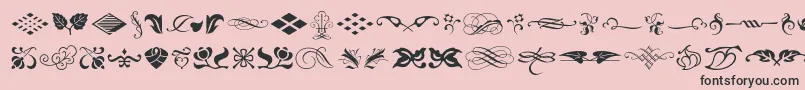 Typeembellishmentsone-Schriftart – Schwarze Schriften auf rosa Hintergrund