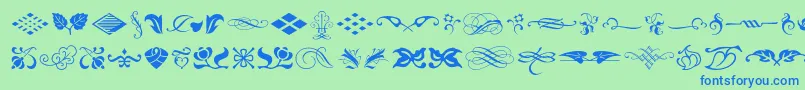 Шрифт Typeembellishmentsone – синие шрифты на зелёном фоне