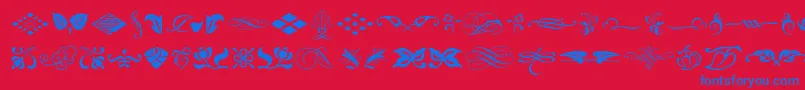 Fonte Typeembellishmentsone – fontes azuis em um fundo vermelho