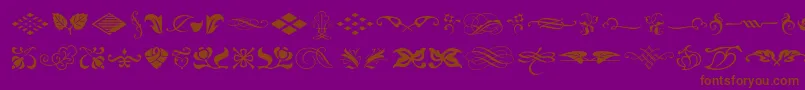 フォントTypeembellishmentsone – 紫色の背景に茶色のフォント