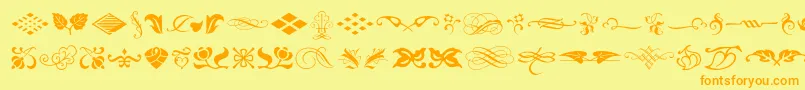 Fonte Typeembellishmentsone – fontes laranjas em um fundo amarelo