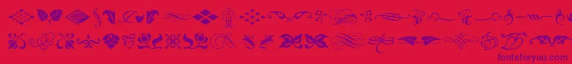 Fonte Typeembellishmentsone – fontes roxas em um fundo vermelho