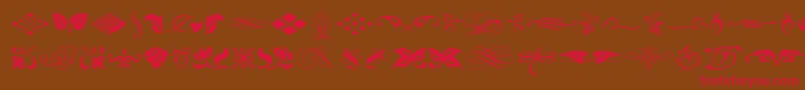 Typeembellishmentsone Font – Red Fonts on Brown Background
