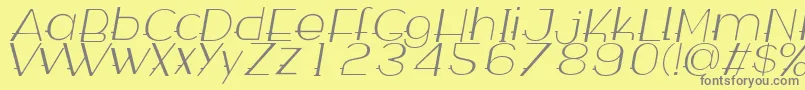 フォントWabeco Thinitalic – 黄色の背景に灰色の文字