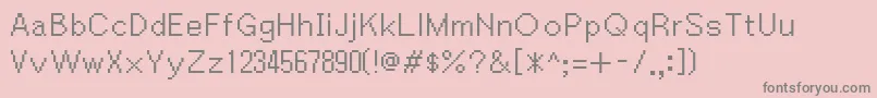 フォントIgiari – ピンクの背景に灰色の文字