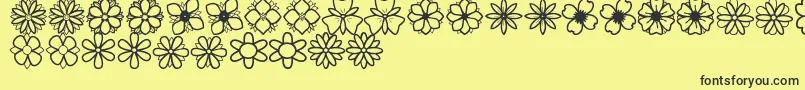 Fonte SecondFlowersSt – fontes pretas em um fundo amarelo