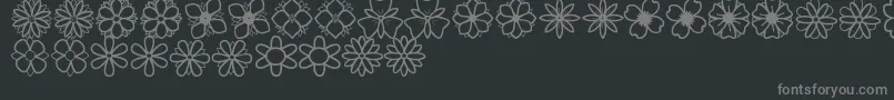 SecondFlowersSt Font – Gray Fonts on Black Background