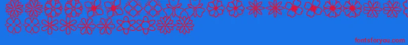 SecondFlowersSt-Schriftart – Rote Schriften auf blauem Hintergrund