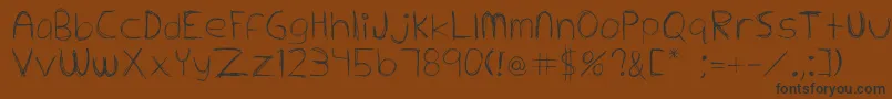 Extrafine Font – Black Fonts on Brown Background