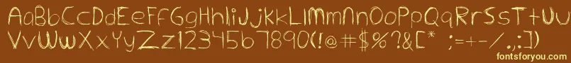 Extrafine-fontti – keltaiset fontit ruskealla taustalla