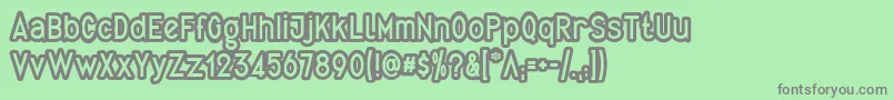 QuirkusOut Font – Gray Fonts on Green Background